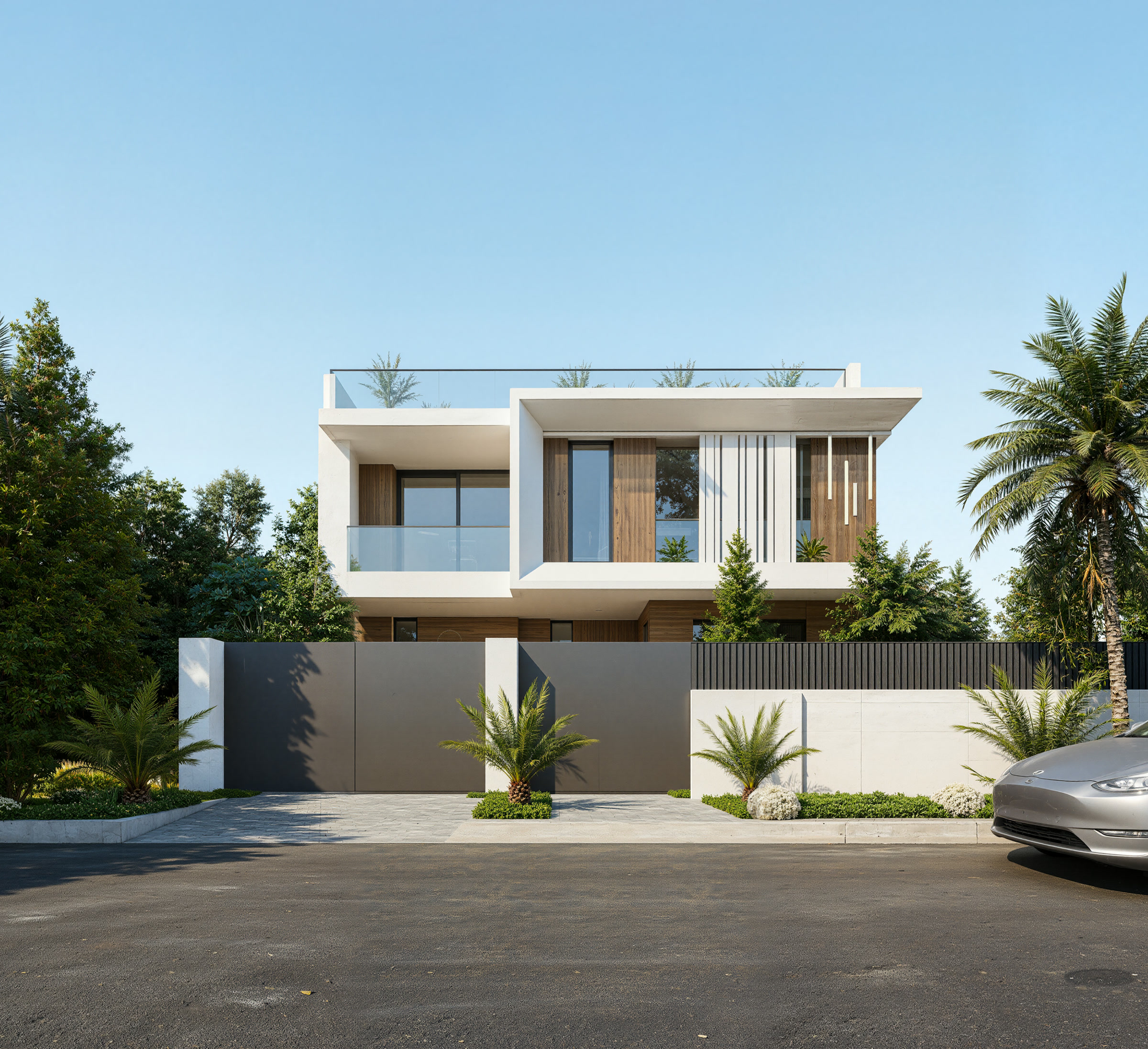 Villa YB façade sur rue avec palmiers et clôture, lotissement Akenza Marrakech